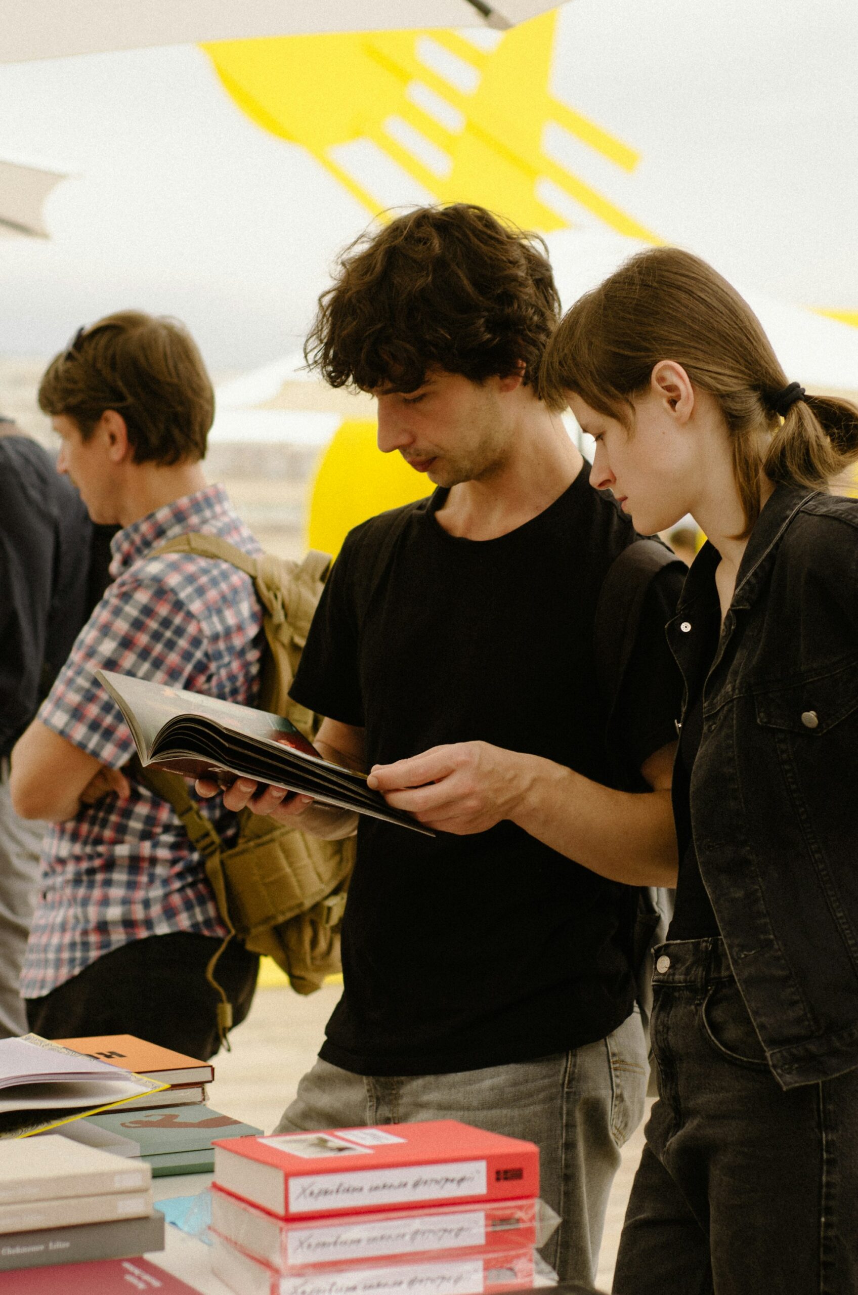 Shoppers previewing a book